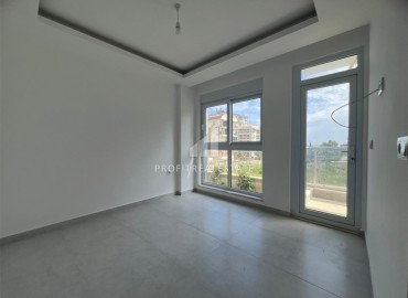Новая двухкомнатная квартира, 52м², с чистовой отделкой в комплексе с инфраструктурой в Авсалларе, Алания ID-19104 фото-7