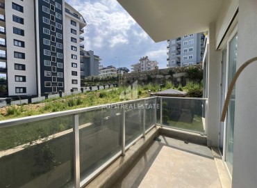 Новая двухкомнатная квартира, 52м², с чистовой отделкой в комплексе с инфраструктурой в Авсалларе, Алания ID-19104 фото-8