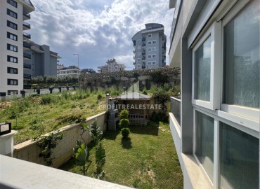 Новая двухкомнатная квартира, 52м², с чистовой отделкой в комплексе с инфраструктурой в Авсалларе, Алания ID-19104 фото-9
