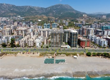 Старт продаж: апартаменты 50-194м², в элитном инвестиционном проекте на первой береговой линии в районе Алании – Махмутлар ID-19109 фото-2