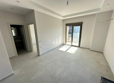 Квартира с одной спальней, 55м², с чистовой отделкой в комфортабельном комплексе у моря в районе Кестель, Алания ID-19111 фото-9