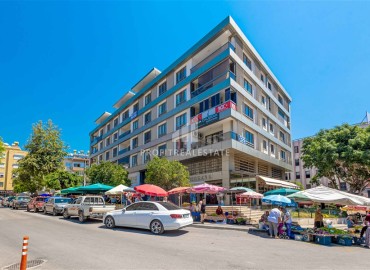 Меблированная двухкомнатная квартира, 55м², в недорогом комплексе в 700м от моря в районе Оба, Алания ID-19112 фото-1