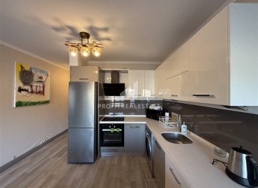 Меблированная двухкомнатная квартира, 55м², в недорогом комплексе в 700м от моря в районе Оба, Алания ID-19112 фото-6