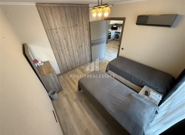 Меблированная двухкомнатная квартира, 55м², в недорогом комплексе в 700м от моря в районе Оба, Алания ID-19112 фото-9