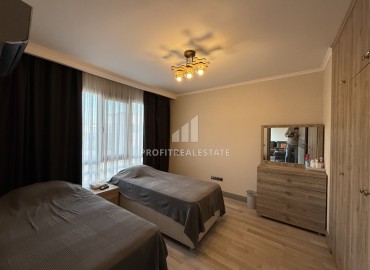 Меблированная двухкомнатная квартира, 55м², в недорогом комплексе в 700м от моря в районе Оба, Алания ID-19112 фото-11