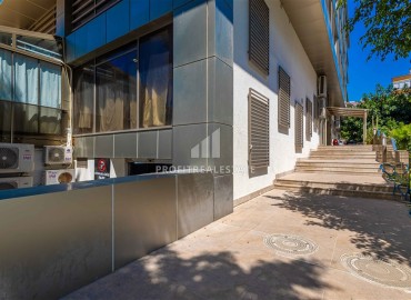 Меблированная двухкомнатная квартира, 55м², в недорогом комплексе в 700м от моря в районе Оба, Алания ID-19112 фото-13