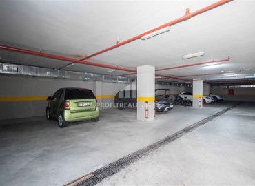 Меблированная двухкомнатная квартира, 55м², в недорогом комплексе в 700м от моря в районе Оба, Алания ID-19112 фото-15