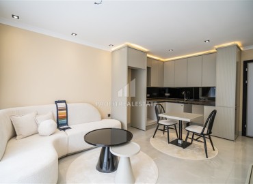 Элегантная двухкомнатная квартира, 42м², в элитной резиденции в 850м от моря в Махмутларе, Алания ID-19113 фото-2