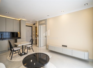 Элегантная двухкомнатная квартира, 42м², в элитной резиденции в 850м от моря в Махмутларе, Алания ID-19113 фото-3