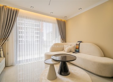 Элегантная двухкомнатная квартира, 42м², в элитной резиденции в 850м от моря в Махмутларе, Алания ID-19113 фото-4