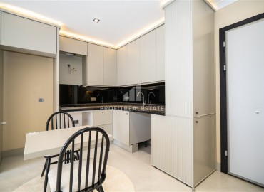 Элегантная двухкомнатная квартира, 42м², в элитной резиденции в 850м от моря в Махмутларе, Алания ID-19113 фото-5