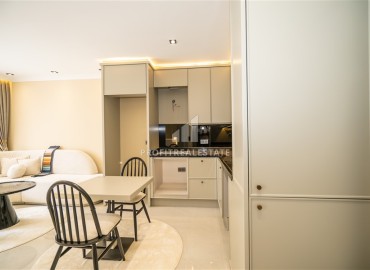 Элегантная двухкомнатная квартира, 42м², в элитной резиденции в 850м от моря в Махмутларе, Алания ID-19113 фото-6