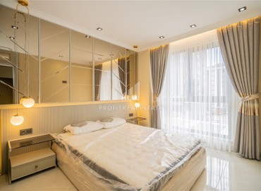 Элегантная двухкомнатная квартира, 42м², в элитной резиденции в 850м от моря в Махмутларе, Алания ID-19113 фото-9