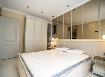 Элегантная двухкомнатная квартира, 42м², в элитной резиденции в 850м от моря в Махмутларе, Алания ID-19113 фото-10