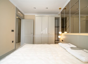 Элегантная двухкомнатная квартира, 42м², в элитной резиденции в 850м от моря в Махмутларе, Алания ID-19113 фото-11