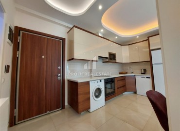 Элегантные апартаменты с одной спальней, 70м², в элитном комплексе, в 400 метрах от моря в Махмутларе, Алания ID-19114 фото-3