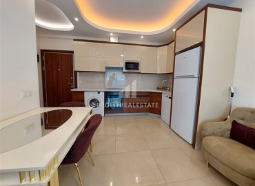 Элегантные апартаменты с одной спальней, 70м², в элитном комплексе, в 400 метрах от моря в Махмутларе, Алания ID-19114 фото-6