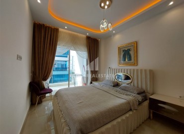 Элегантные апартаменты с одной спальней, 70м², в элитном комплексе, в 400 метрах от моря в Махмутларе, Алания ID-19114 фото-7