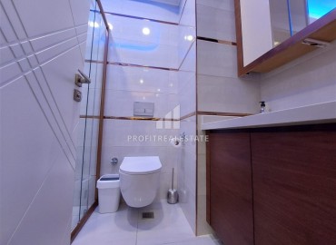 Элегантные апартаменты с одной спальней, 70м², в элитном комплексе, в 400 метрах от моря в Махмутларе, Алания ID-19114 фото-9