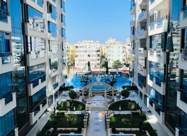 Элегантные апартаменты с одной спальней, 70м², в элитном комплексе, в 400 метрах от моря в Махмутларе, Алания ID-19114 фото-13