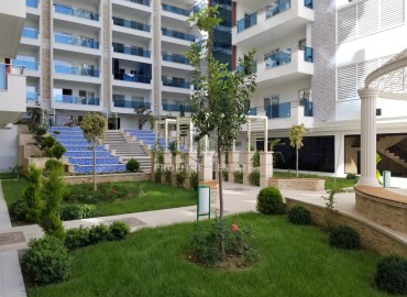 Элегантные апартаменты с одной спальней, 70м², в элитном комплексе, в 400 метрах от моря в Махмутларе, Алания ID-19114 фото-20
