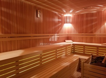 Элегантные апартаменты с одной спальней, 70м², в элитном комплексе, в 400 метрах от моря в Махмутларе, Алания ID-19114 фото-24