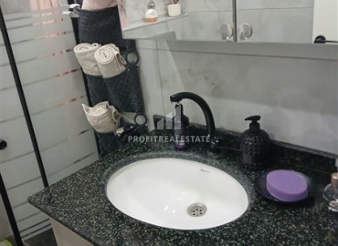 Элегантная квартира с одной спальней, 65м², готовая к проживанию, в 300м от моря в районе Алании - Оба ID-19117 фото-9