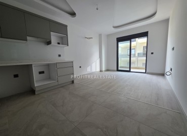 Комфортабельная двухкомнатная квартира, 60м², в комплексе с отельной инфраструктурой, у моря в Махмутларе, Алания ID-19122 фото-6