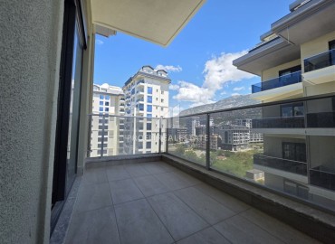 Комфортабельная двухкомнатная квартира, 60м², в комплексе с отельной инфраструктурой, у моря в Махмутларе, Алания ID-19122 фото-12