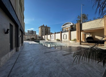 Комфортабельная двухкомнатная квартира, 60м², в комплексе с отельной инфраструктурой, у моря в Махмутларе, Алания ID-19122 фото-23