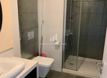 Элегантная квартира 1+1, 55м², на высоком этаже с потрясающим видом в элитном комплексе Махмулара, Алания ID-19125 фото-5