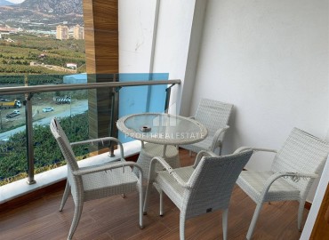 Элегантная квартира 1+1, 55м², на высоком этаже с потрясающим видом в элитном комплексе Махмулара, Алания ID-19125 фото-8