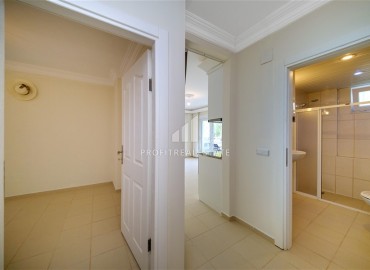 Квартира с двумя спальнями, 85м², без мебели, с выходом в сад в резиденции с бассейном в районе Алании – Оба. ID-19126 фото-8