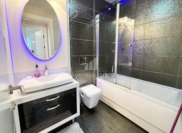 Стильная трехкомнатная квартира, 115м², в элитном комплексе у подножия Торосских гор в Махмутларе, Алания ID-19129 фото-9