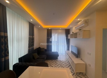 Элегантная квартира с одной спальней, 56м² в элитном комплексе с отличной локацией в Махмутларе, Алания ID-19133 фото-2