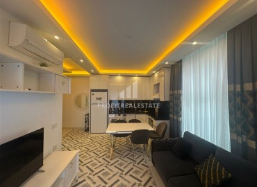Элегантная квартира с одной спальней, 56м² в элитном комплексе с отличной локацией в Махмутларе, Алания ID-19133 фото-3