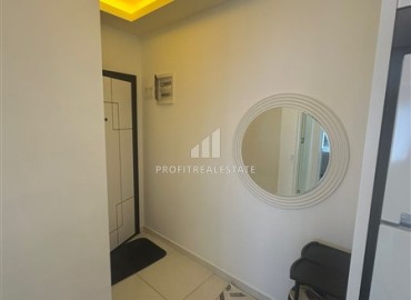 Элегантная квартира с одной спальней, 56м² в элитном комплексе с отличной локацией в Махмутларе, Алания ID-19133 фото-5