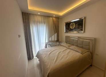 Элегантная квартира с одной спальней, 56м² в элитном комплексе с отличной локацией в Махмутларе, Алания ID-19133 фото-6