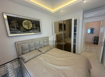 Элегантная квартира с одной спальней, 56м² в элитном комплексе с отличной локацией в Махмутларе, Алания ID-19133 фото-7