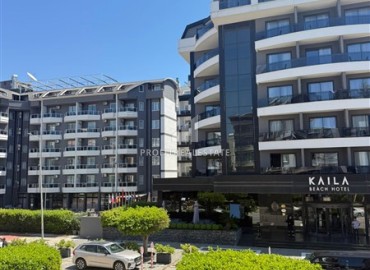 Трехкомнатные меблированные апартаменты, 110м², в комплексе с бассейном, у моря в районе Оба, Алания под ВНЖ ID-19136 фото-33
