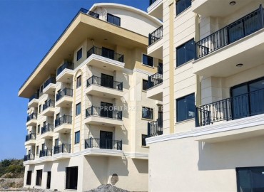 Апартаменты с одной спальней, 50м², с чистовой отделкой в новой резиденции премиум класса в районе Конаклы, Алания ID-19138 фото-12