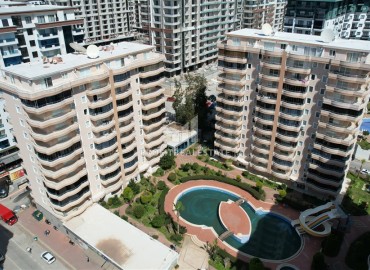 Квартира с двумя спальнями, 125м², с видом на море и горы, в уютном комплексе в 300м от моря в Махмутларе, Алания ID-19139 фото-1