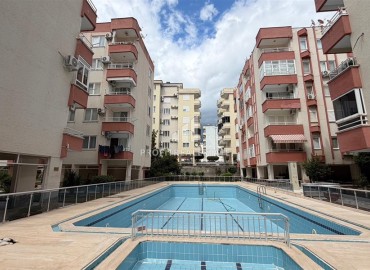 Недорогая вторичная недвижимость: квартира 3+1, 100м², с мебелью и техникой в 250 м от моря в Махмутларе, Алания ID-19146 фото-1