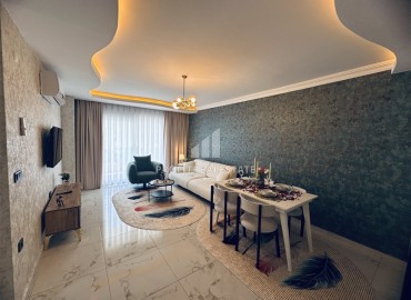 Стильные апартаменты с одной спальней, 68м², в комплексе с бассейном с отличной локацией в 400м от моря в Махмутларе, Алания ID-19147 фото-6