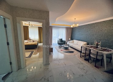 Стильные апартаменты с одной спальней, 68м², в комплексе с бассейном с отличной локацией в 400м от моря в Махмутларе, Алания ID-19147 фото-16