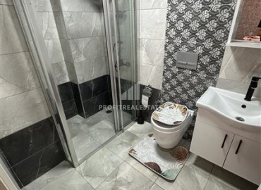 Стильные апартаменты с одной спальней, 68м², в комплексе с бассейном с отличной локацией в 400м от моря в Махмутларе, Алания ID-19147 фото-21