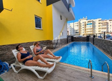Стильные апартаменты с одной спальней, 68м², в комплексе с бассейном с отличной локацией в 400м от моря в Махмутларе, Алания ID-19147 фото-24