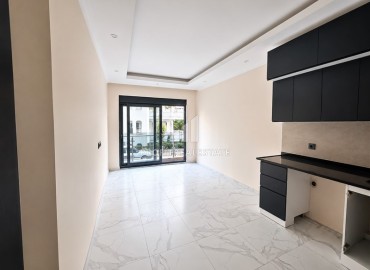 Апартаменты с одной спальней, 55м² с чистовой отделкой в комфортабельном комплексе, в центре Алании, 150м до моря ID-19154 фото-3