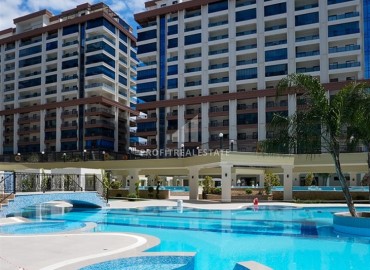 Элитные двухкомнатные апартаменты, 68м², в фешенебельном комплексе в Махмутларе, Алания, 600м от моря ID-19157 фото-1