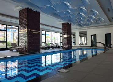 Элитные двухкомнатные апартаменты, 68м², в фешенебельном комплексе в Махмутларе, Алания, 600м от моря ID-19157 фото-18